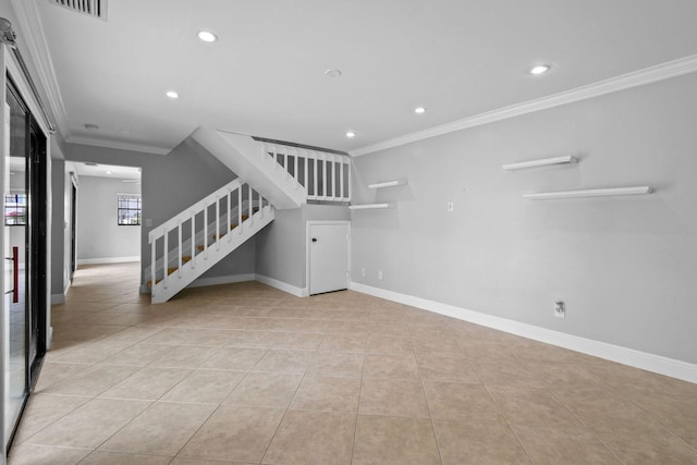 unfurnished living room featuring light tile patterned floors and ornamental molding