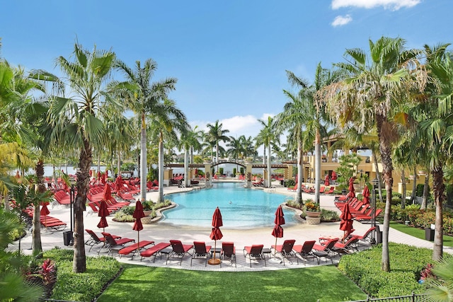 view of swimming pool featuring a patio area