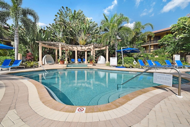 view of pool with a pergola