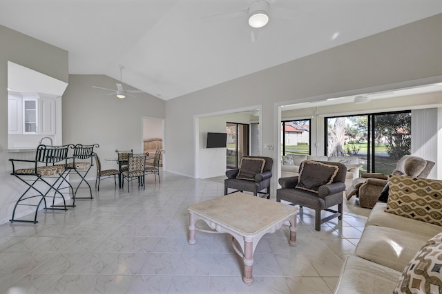 living room featuring lofted ceiling and ceiling fan