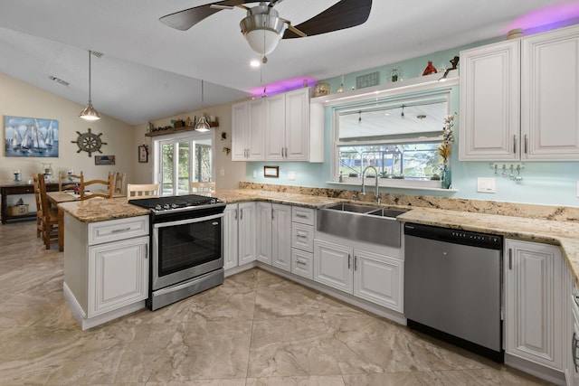 kitchen featuring sink, decorative light fixtures, kitchen peninsula, stainless steel appliances, and white cabinets