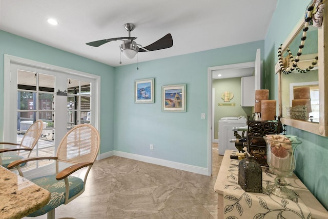 home office featuring washer / clothes dryer and ceiling fan