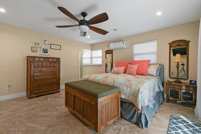 bedroom with ceiling fan and a wall mounted AC