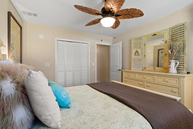 bedroom featuring ceiling fan and a closet