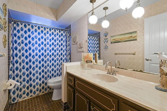 bathroom featuring vanity, toilet, curtained shower, and tile patterned flooring