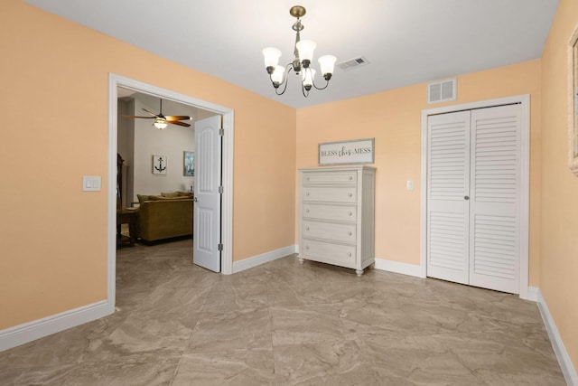 unfurnished dining area featuring a notable chandelier