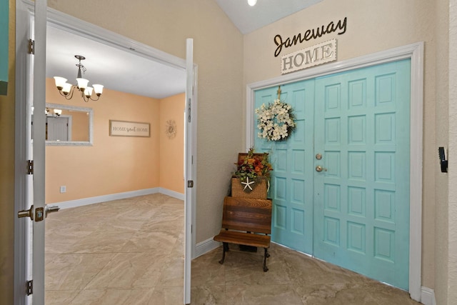 foyer featuring an inviting chandelier