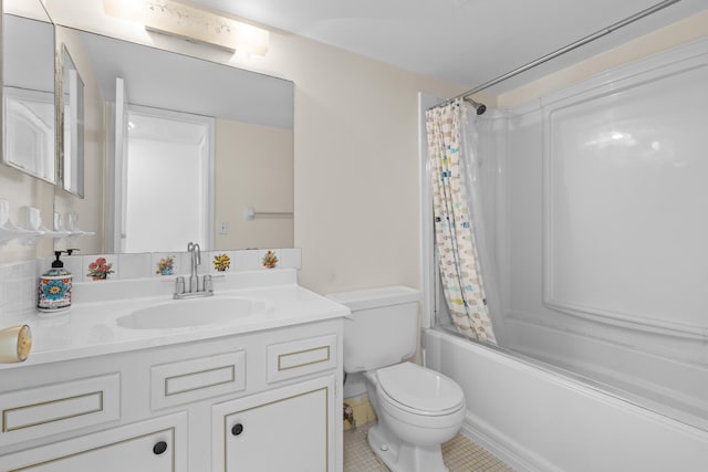 full bathroom featuring vanity, tile patterned floors, toilet, and shower / bath combo with shower curtain