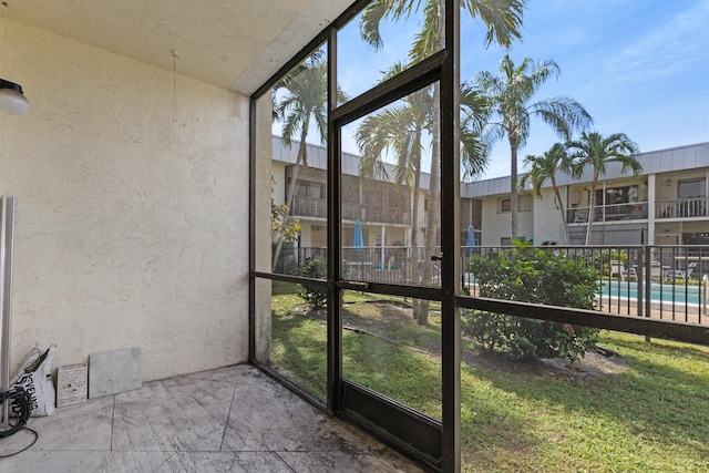 view of unfurnished sunroom