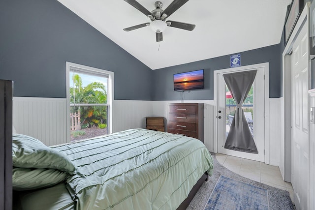 bedroom featuring light tile patterned flooring, ceiling fan, access to exterior, and vaulted ceiling