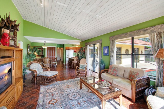 living room featuring lofted ceiling and wooden ceiling