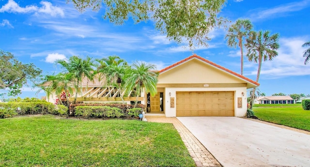 view of front facade featuring concrete driveway, an attached garage, a front lawn, and stucco siding