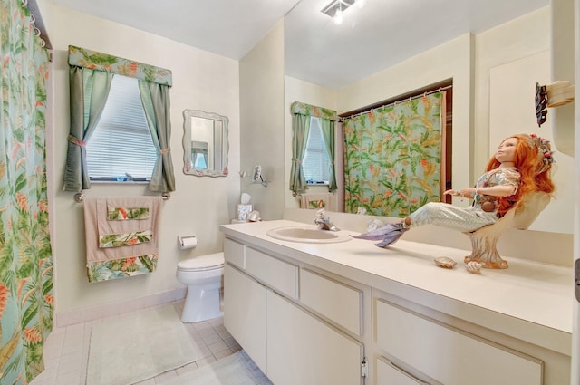 full bathroom featuring visible vents, toilet, vanity, tile patterned flooring, and baseboards