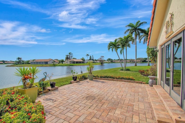 view of patio / terrace with a water view