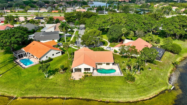 aerial view featuring a water view and a residential view