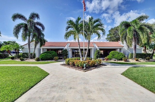 view of front of home with a front yard