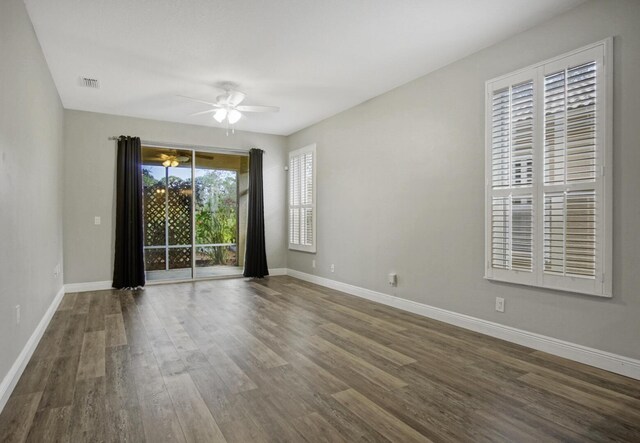 unfurnished room featuring hardwood / wood-style floors and ceiling fan