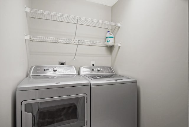 laundry area featuring independent washer and dryer