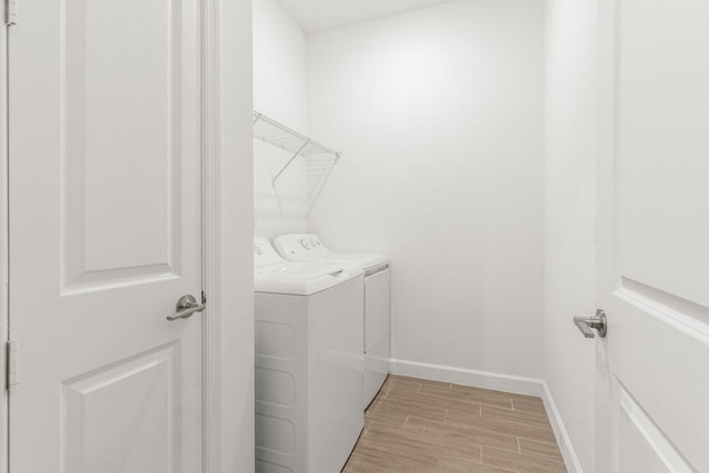 laundry area with washing machine and dryer