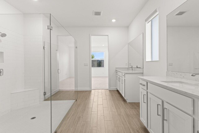 unfurnished dining area featuring hardwood / wood-style flooring and a notable chandelier