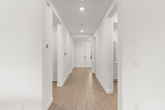 hall featuring light hardwood / wood-style flooring