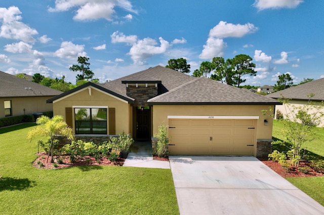 view of front facade featuring a garage and a front yard