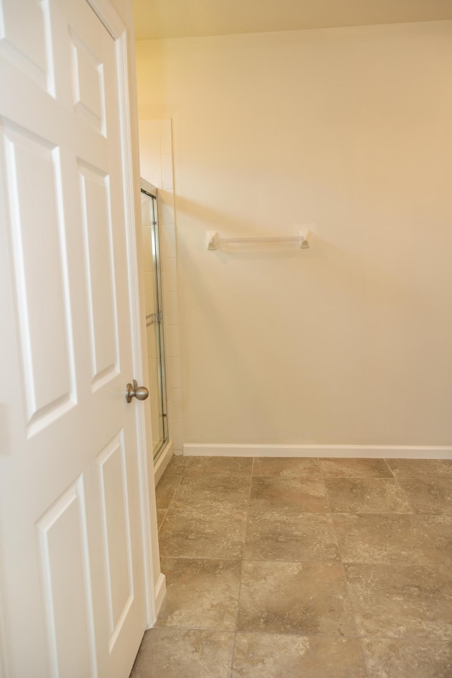 bathroom featuring an enclosed shower