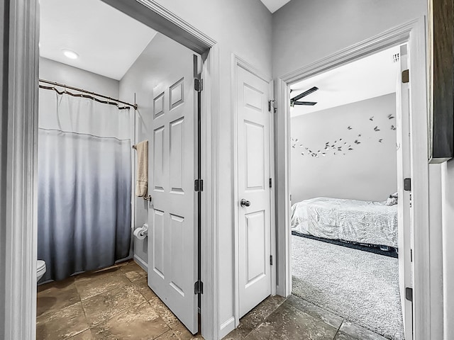 bathroom featuring a shower with shower curtain