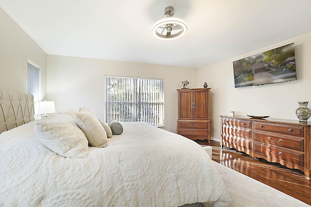 bedroom with hardwood / wood-style flooring