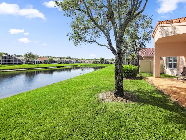 view of yard with a water view