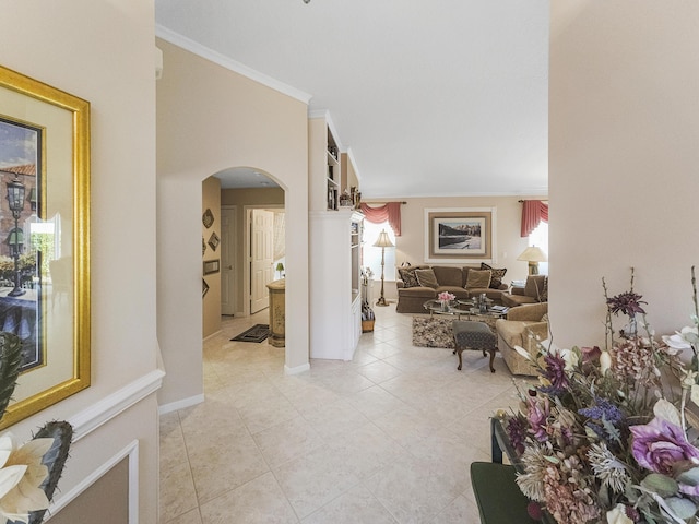 tiled living room with ornamental molding