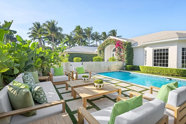 view of swimming pool featuring an outdoor hangout area and a patio