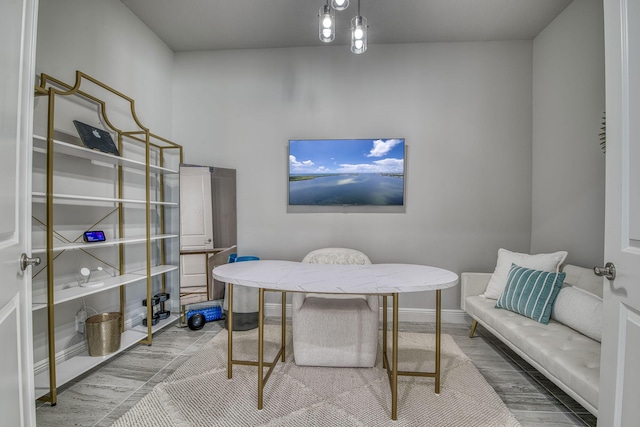 office area with hardwood / wood-style floors