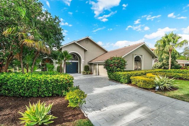 view of front of property with a garage