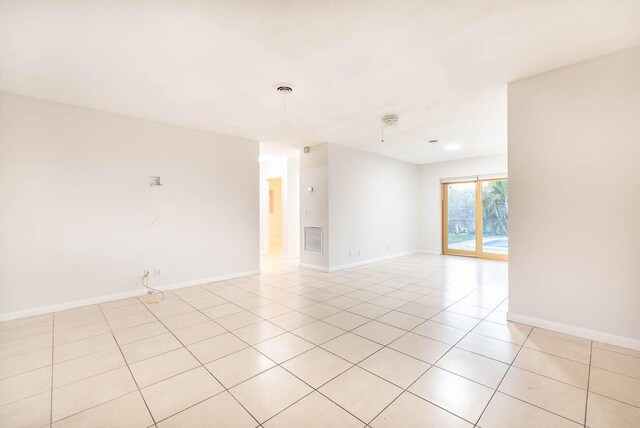 view of tiled spare room