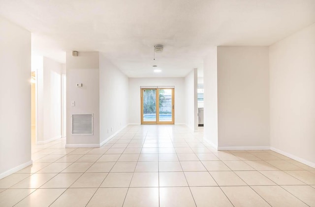 empty room featuring light tile patterned floors