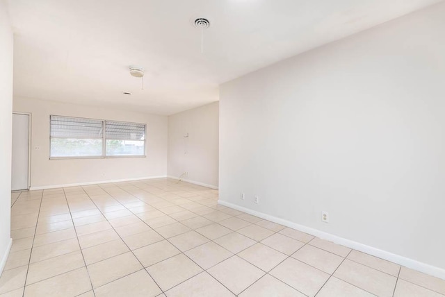 view of tiled spare room