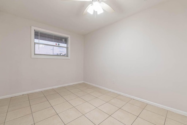 spare room with ceiling fan