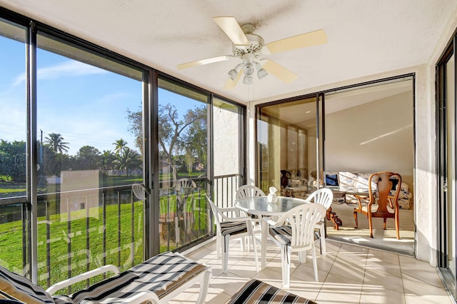 5267 Europa Dr Unit M, Boynton Beach, FL 33437 - sunroom / solarium with floor to ceiling windows and tile patterned flooring