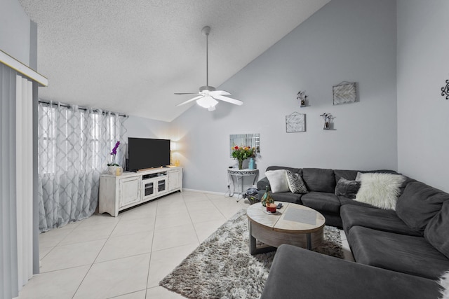 tiled living room featuring high vaulted ceiling, a textured ceiling, and ceiling fan