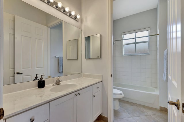 full bathroom featuring toilet, vanity, shower / bathing tub combination, and tile patterned floors