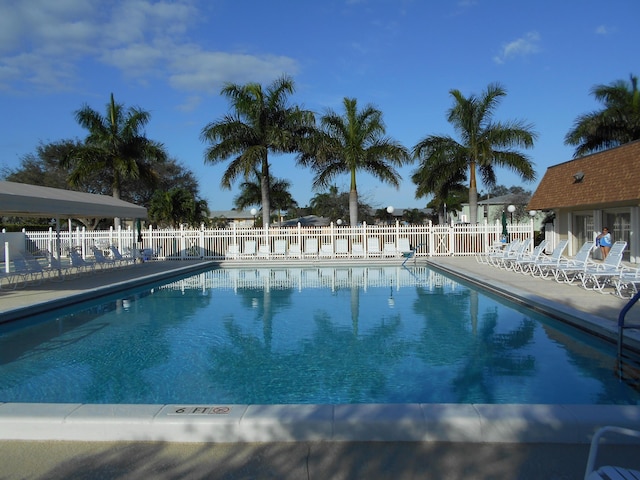 view of swimming pool with a patio area