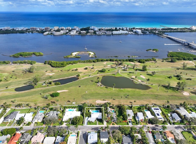 bird's eye view with a water view