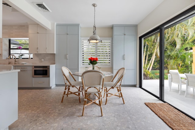 dining area featuring sink