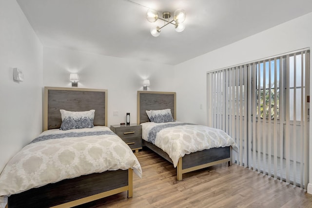 bedroom with light hardwood / wood-style flooring