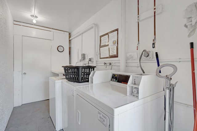 laundry area with washer and clothes dryer