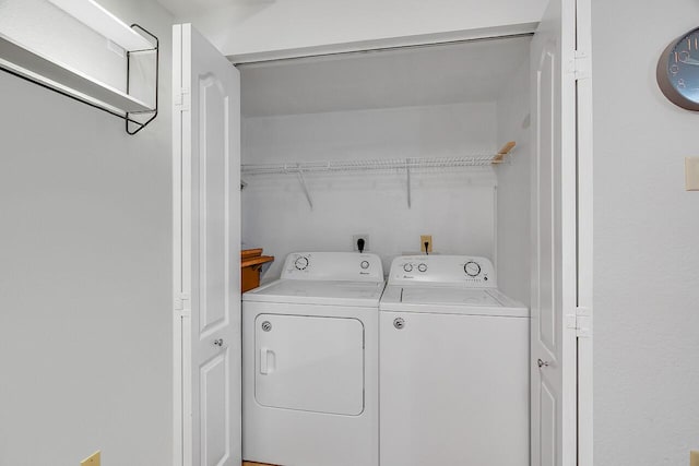 laundry room with laundry area and separate washer and dryer