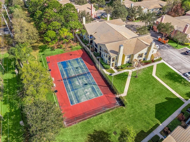 birds eye view of property with a residential view