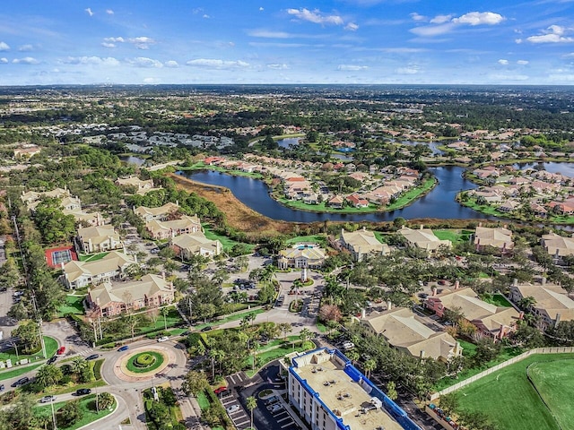 aerial view featuring a water view and a residential view
