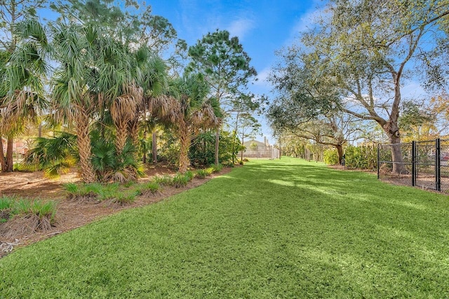 view of yard with fence